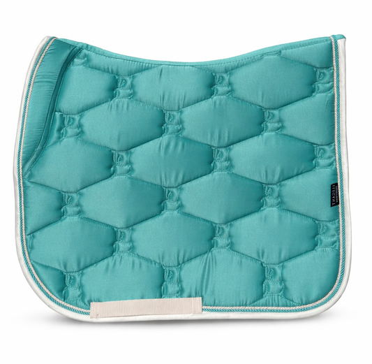 Teal quilted dressage saddle pad with white trim on a white background